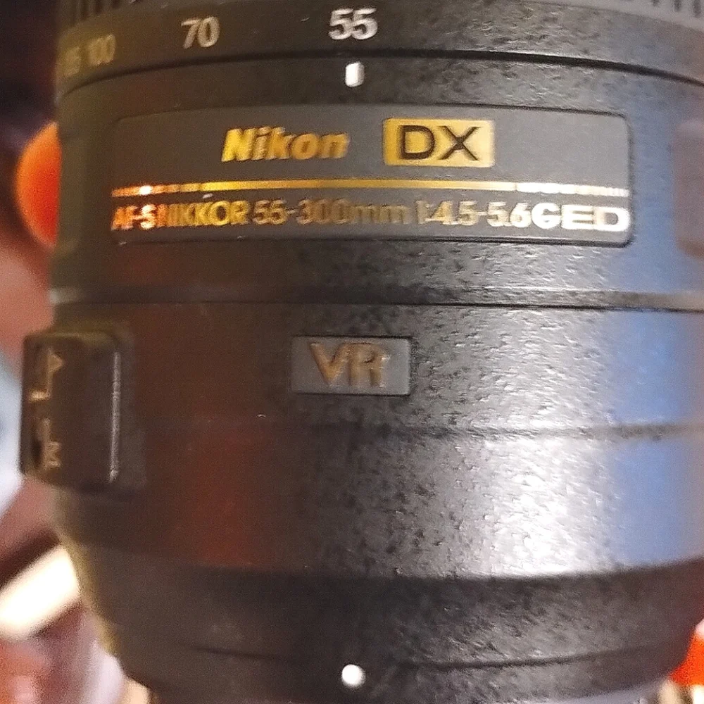 Nikon D 3200 with two lenses and extra light attachment